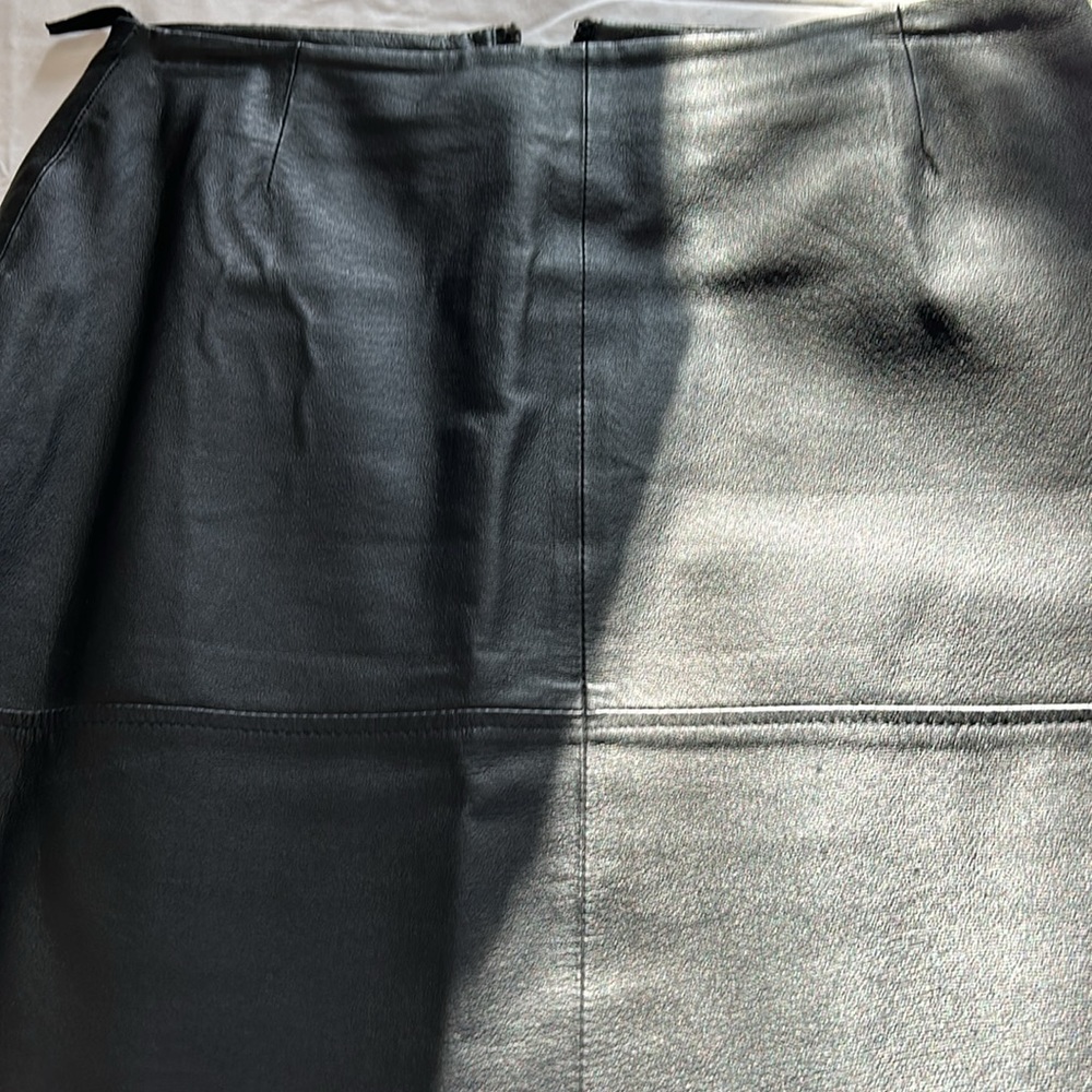 Leather black straight skirt. Size 14. Fully lined. Like new.